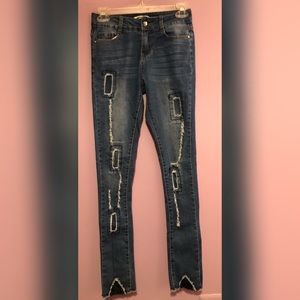 Mid-Rise Distressed Jeans